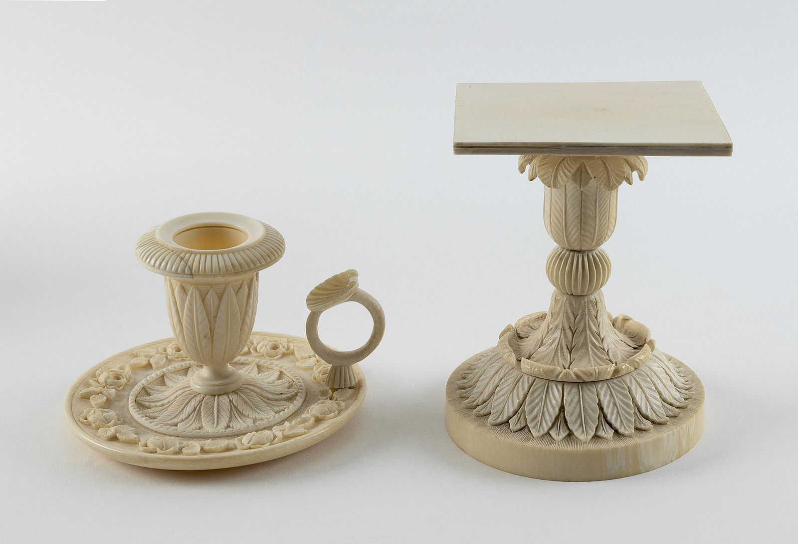 ENGLISH CARVED IVORY CHAMBER STICK AND PEDESTAL STAND Late 19th century Chamber stick height 3". (1 of 2)
