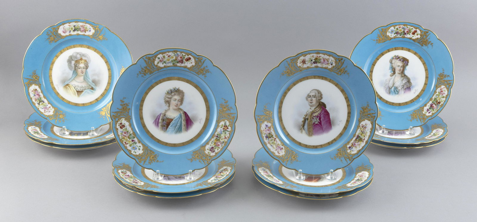 SET OF TWELVE HAND-PAINTED LIMOGES PORCELAIN PLATES Diameter 8.75". (1 of 3)