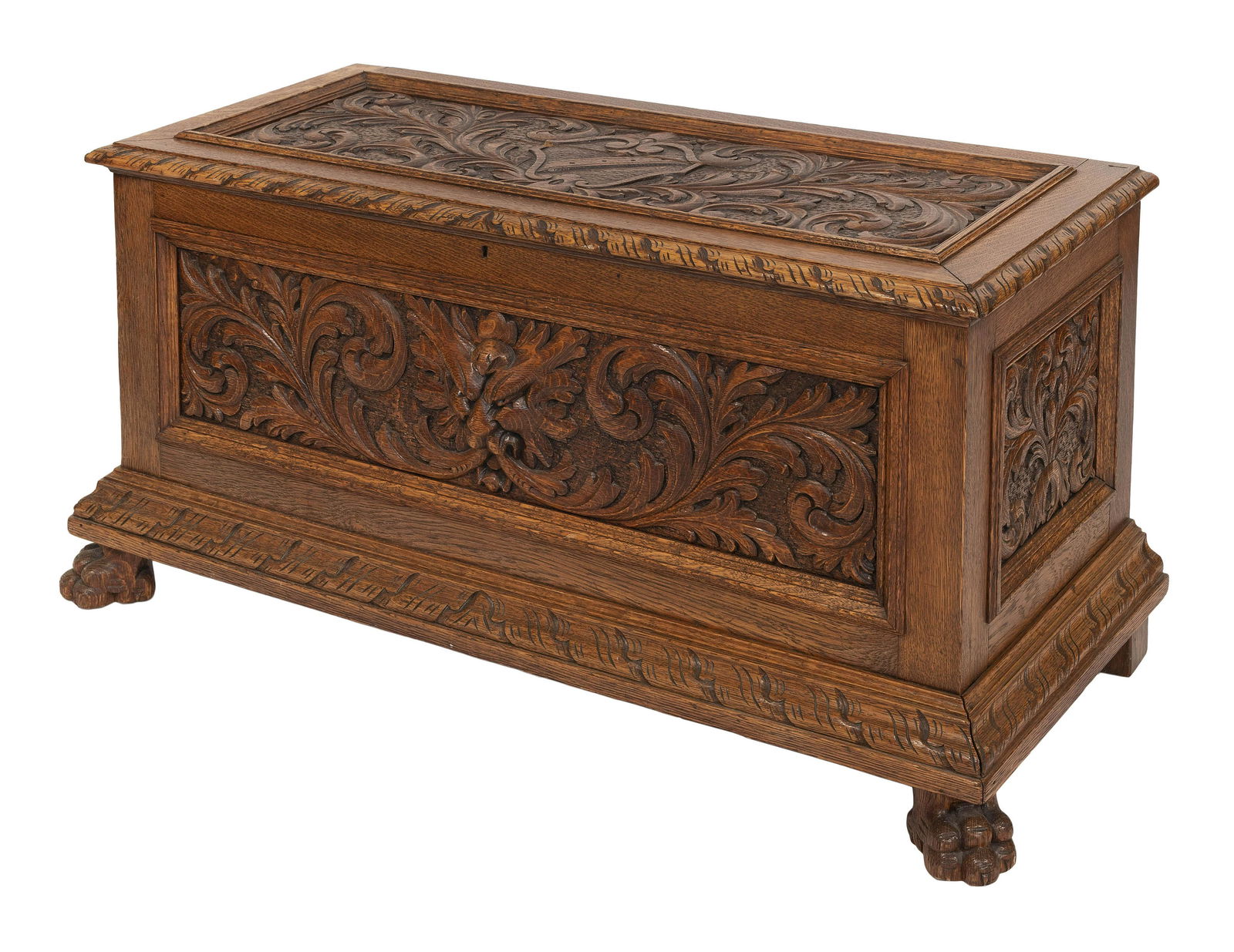 ORNATELY CARVED CHEST Early 20th Century Height 22”. Width 46”. Depth 20.5”. (1 of 2)