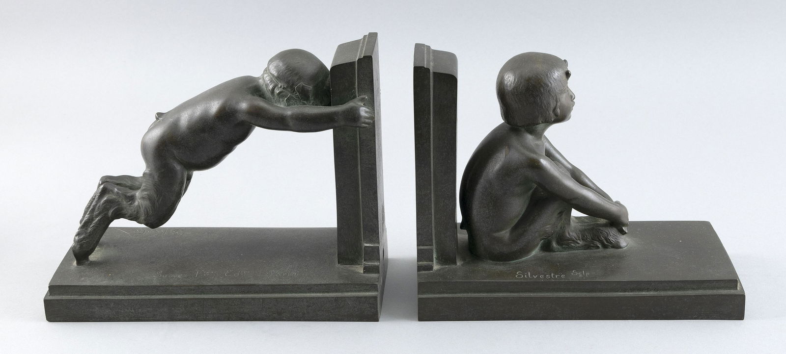 PAUL SILVESTRE (France, 1884-1976), Pair of Art Deco figural bookends, circa 1920., Bronze, heights (1 of 2)