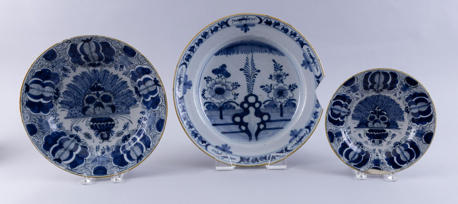 THREE DELFT BLUE AND WHITE PLATES 19th Century Diameters from 8” to 12”. (1 of 2)