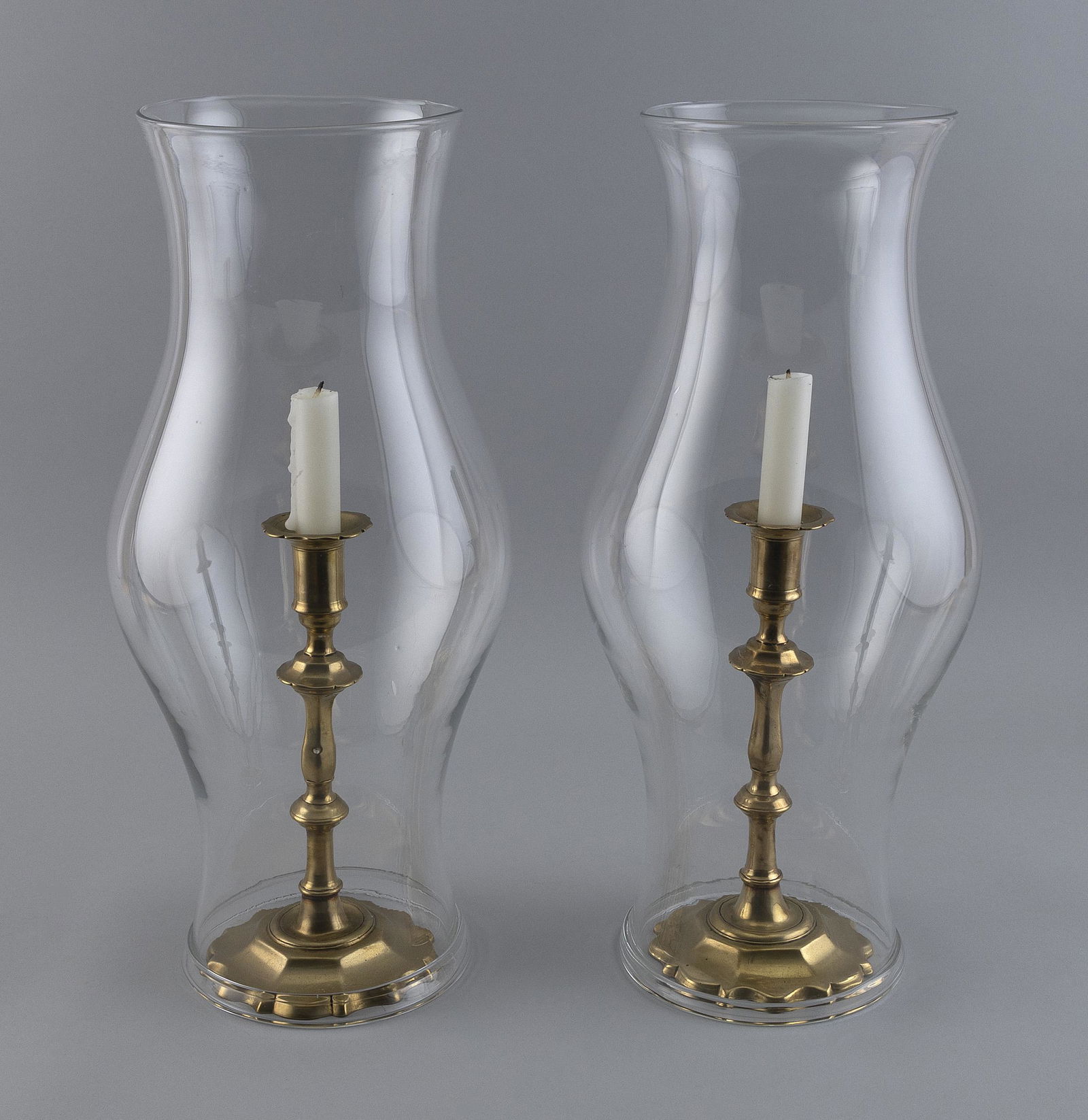 PAIR OF QUEEN ANNE BRASS CANDLESTICKS 18th Century Candlestick heights 9.5". Shade heights 17.25". (1 of 2)