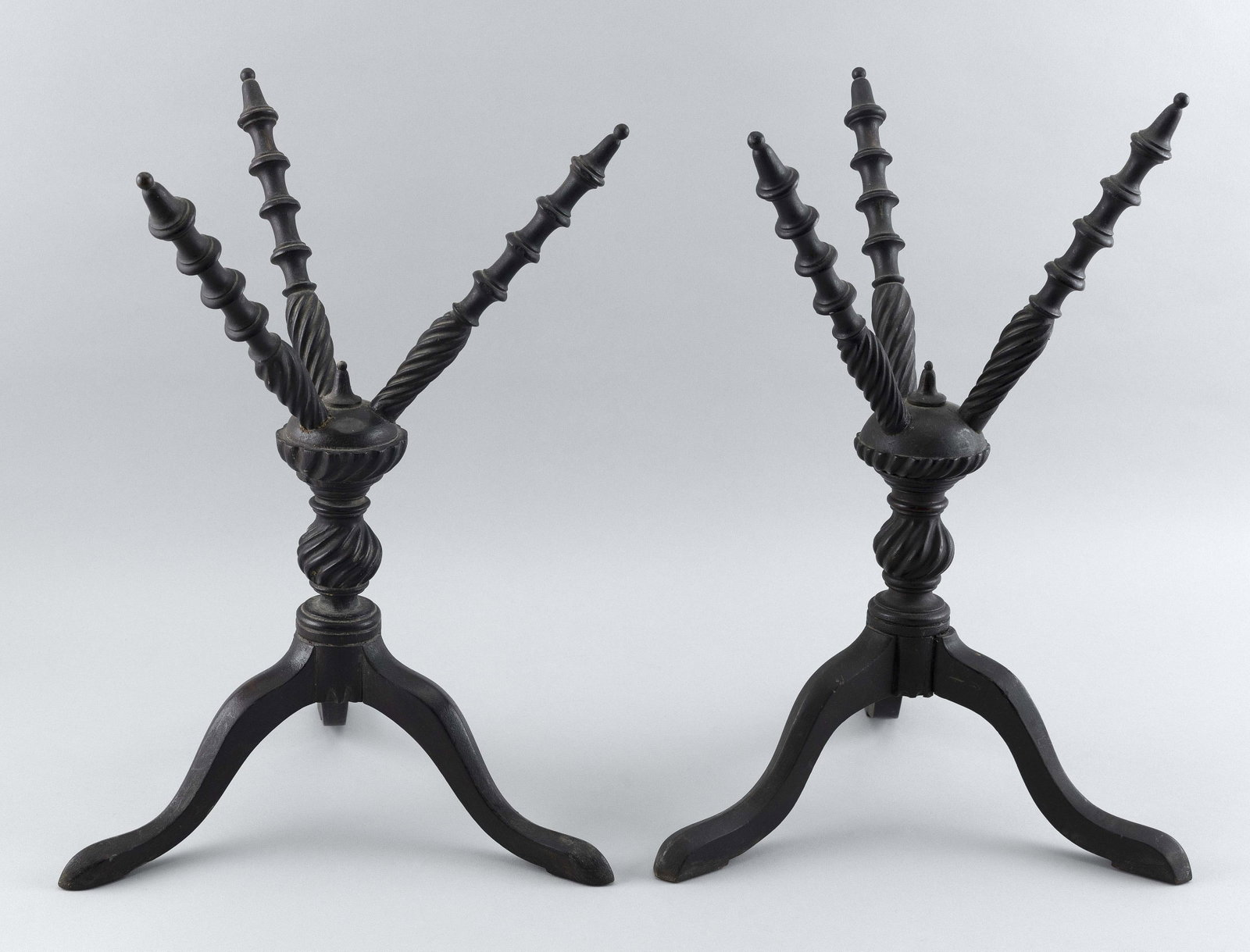 PAIR OF TURNED AND CARVED WOODEN BOWL STANDS Early 19th Century Heights 14.75”.: PAIR OF TURNED AND CARVED WOODEN BOWL STANDS Early 19th Century Under a dark finish. For use on a dining table to display fruit. Heights 14.75”.