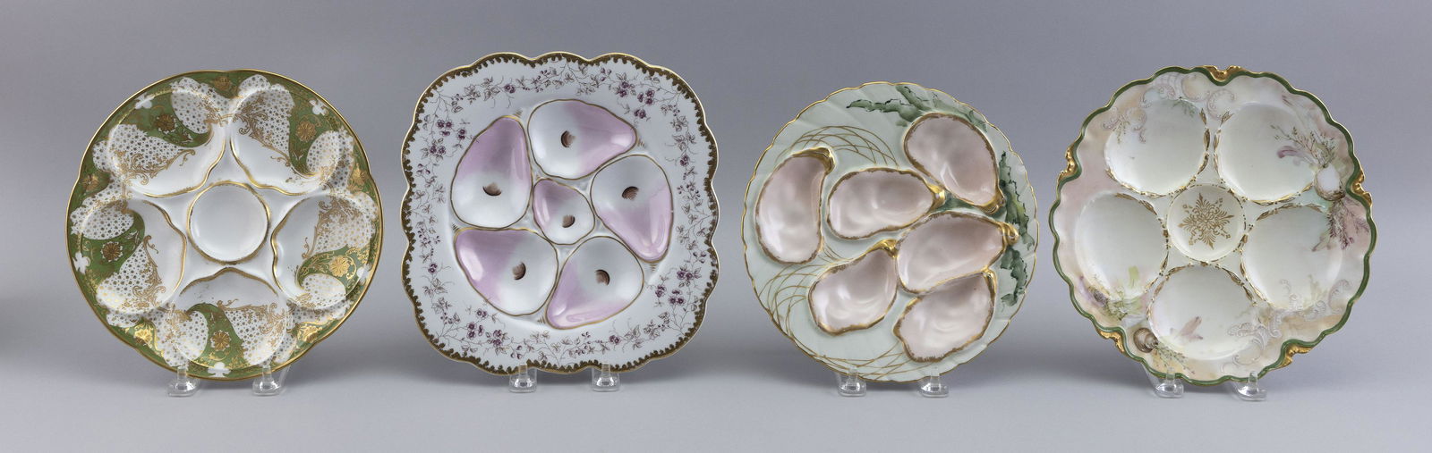 FOUR PORCELAIN OYSTER PLATES Late 19th/Early 20th Century (1 of 2)