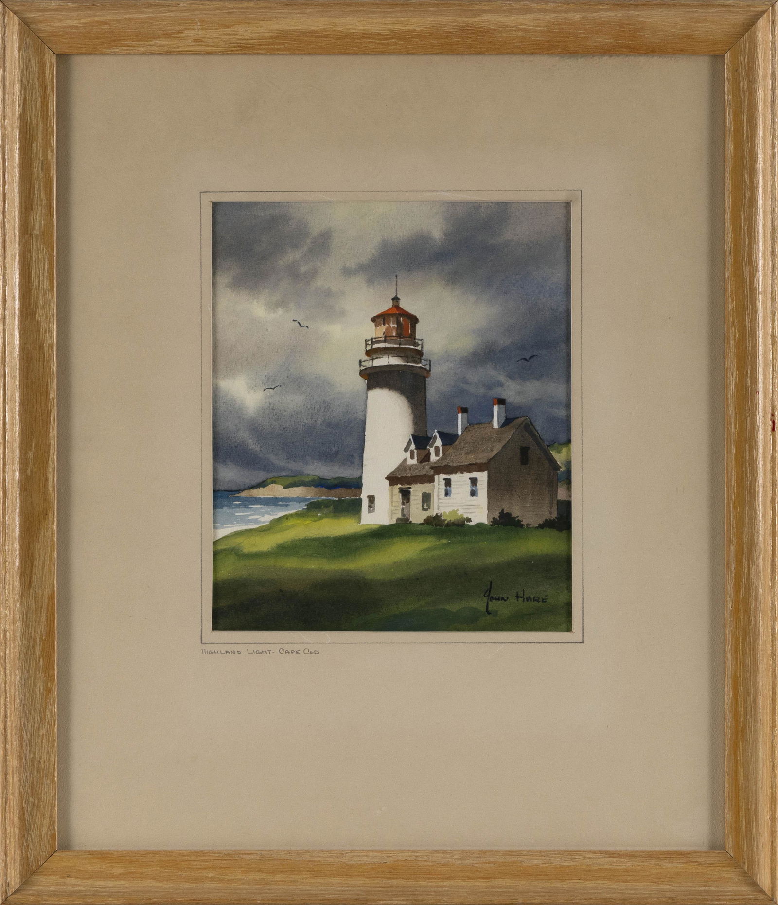 JOHN CUTHBERT HARE (Massachusetts/Florida, 1908-1978), "Highland Light, Cape Cod"., Watercolor on: JOHN CUTHBERT HAREMassachusetts/Florida, 1908-1978"Highland Light, Cape Cod". Signed lower right "John Hare". Titled in pencil on mat lower left.Watercolor on paper, 8" x 6.5&