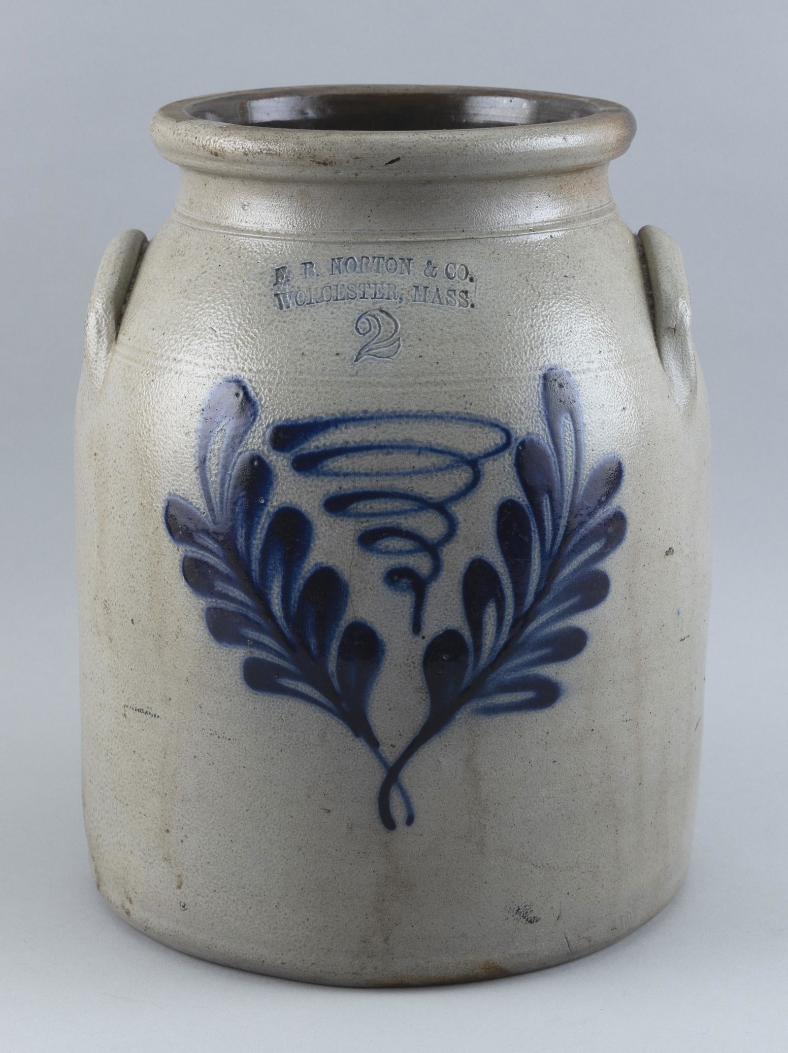 E.B. NORTON & CO. TWO-GALLON STONEWARE CROCK Worcester, Massachusetts, 19th Century Height (1 of 2)