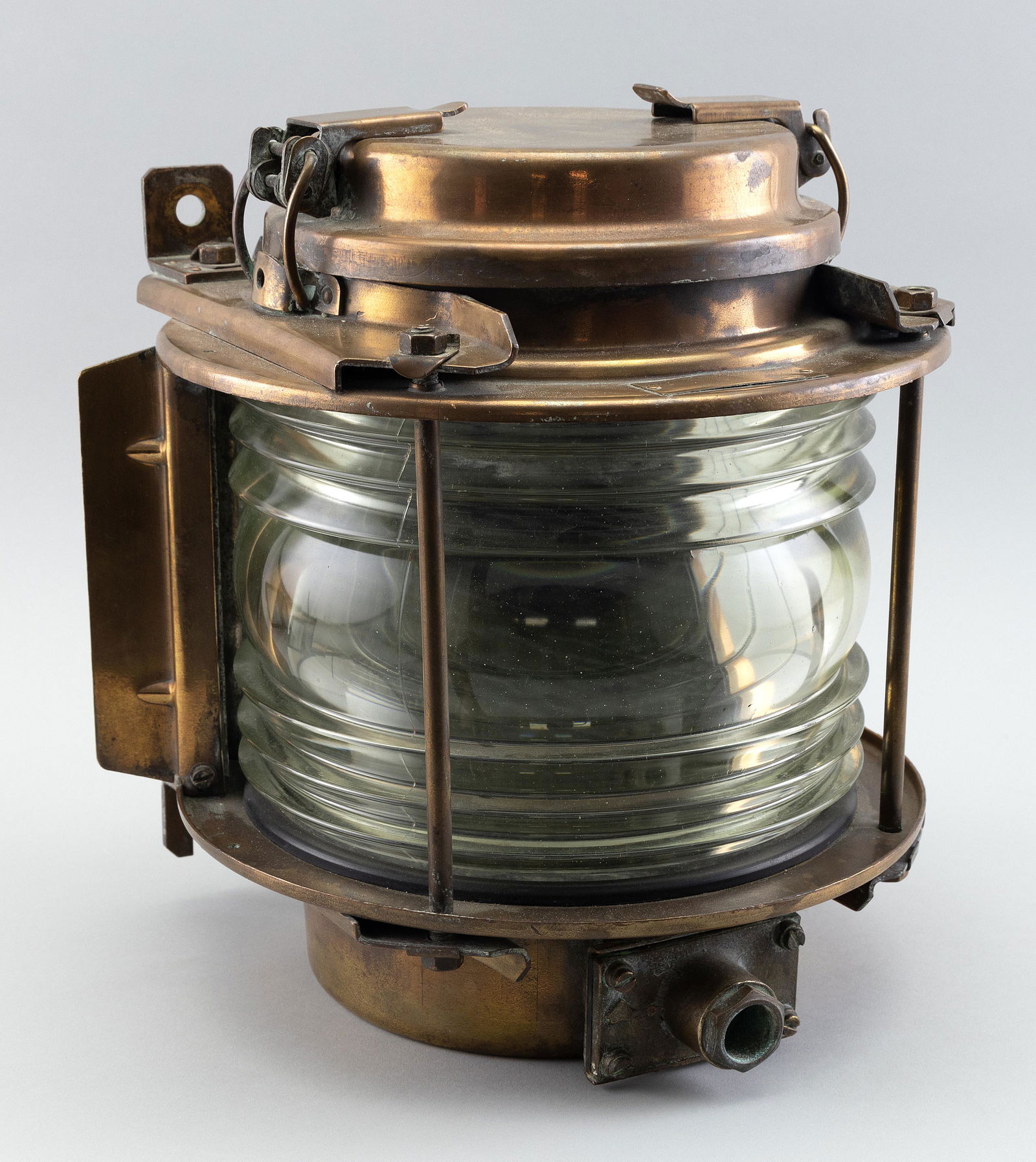 VINTAGE BRONZE SHIP'S LIGHT WITH FRESNEL LENS Early 20th Century Height 12.5”. Diameter (1 of 1)