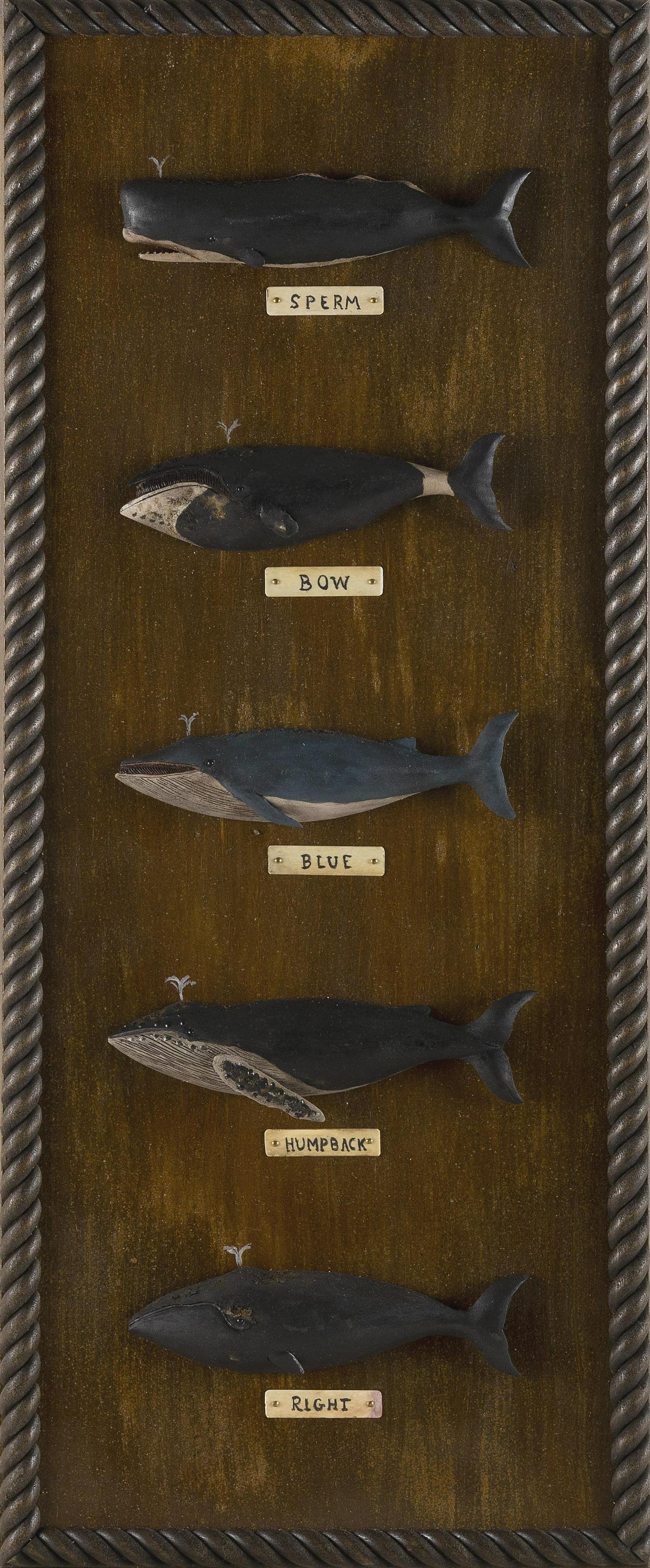 ROGER MITCHELL (Massachusetts, Contemporary), Display of five carved and painted wooden whales., (1 of 2)