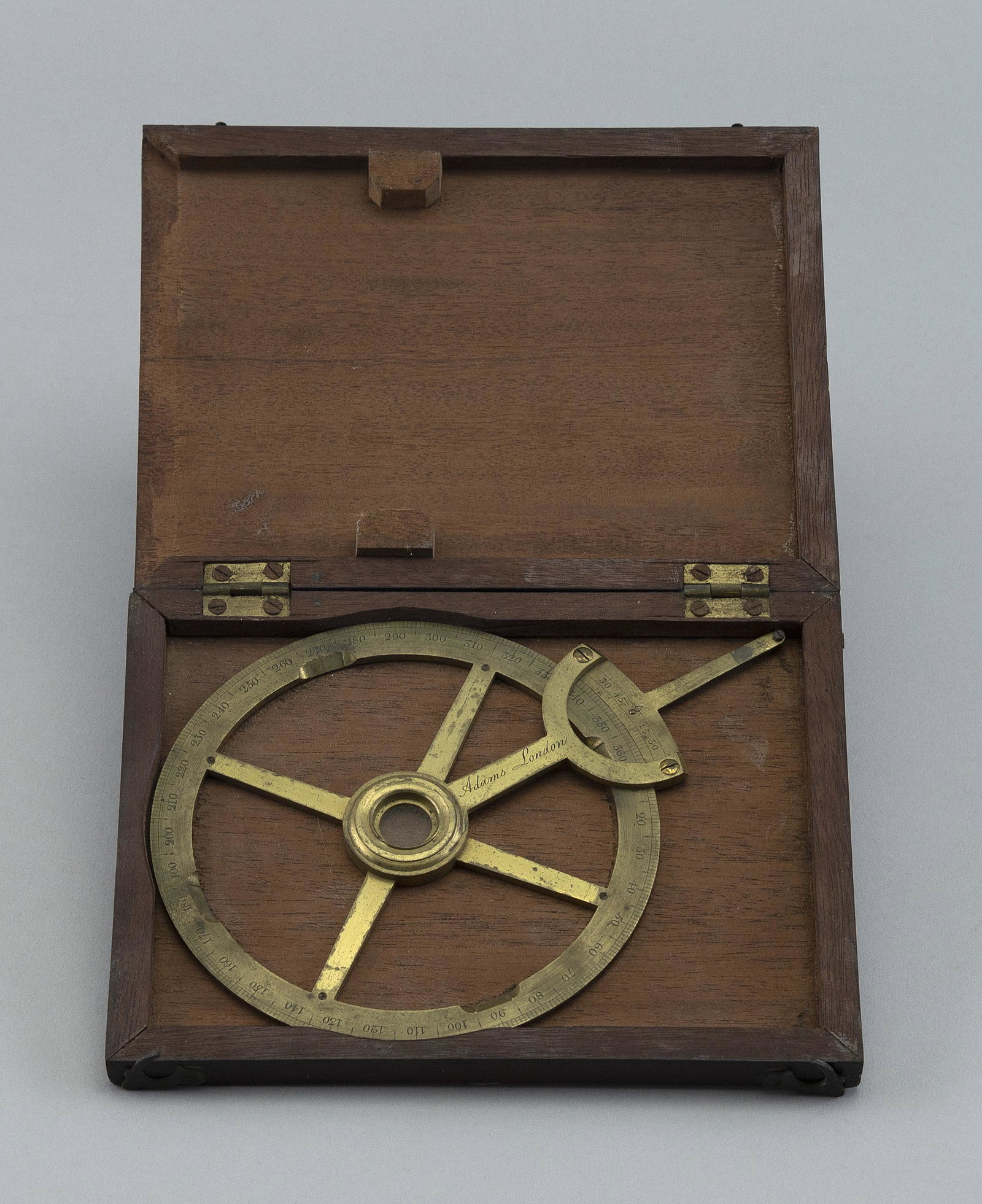 CASED BRASS NAVIGATIONAL RING London, 19th Century Case height 0.75". Width 6.25". Depth 4.75". (1 of 2)