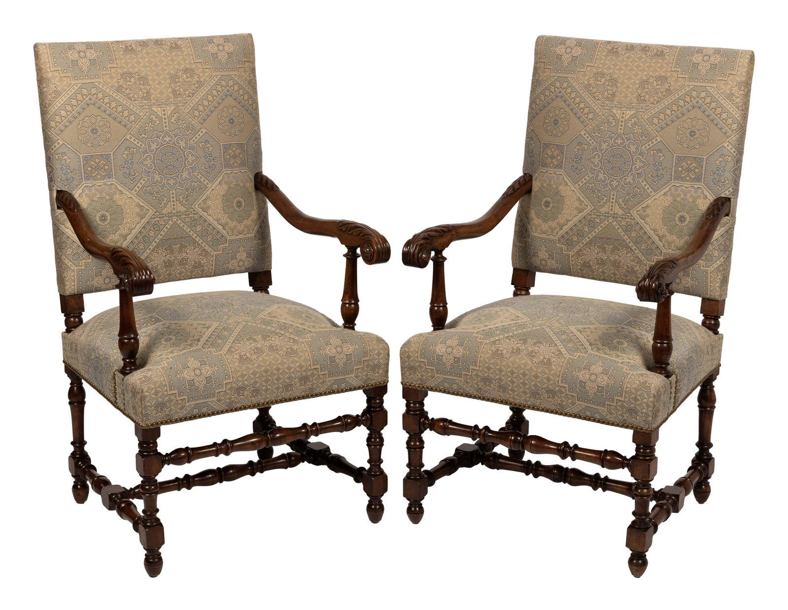 PAIR OF FRENCH OS DE MOUTON ARMCHAIRS 19th Century Back heights 43”. Widths 24”. Depths: PAIR OF FRENCH OS DE MOUTON ARMCHAIRS 19th Century In walnut. Pale blue and cream-colored printed upholstery on backs and seats finished with nailhead trim. Shaped arms with carved acanthus scroll knu