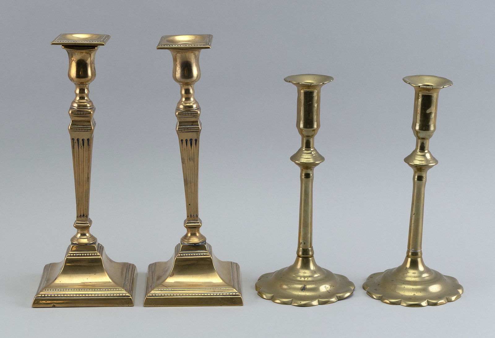 TWO PAIRS OF BRASS CANDLESTICKS 18th/19th Century (1 of 2)