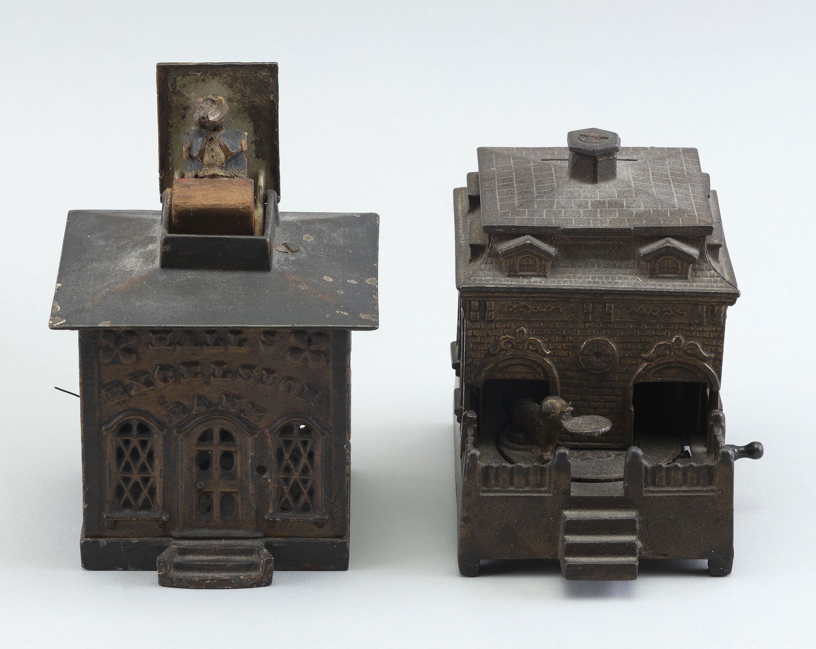TWO CAST IRON MECHANICAL BANKS Late 19th Century (1 of 2)