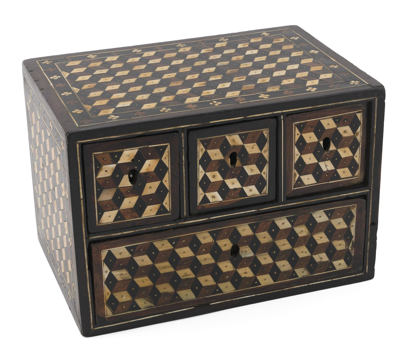 CONTINENTAL INLAID BOX Possibly 17th Century Height 8”. Width 11.5”. Depth 8”.: CONTINENTAL INLAID BOXPossibly 17th CenturyGeometric patterns formed from inlaid bone, ebony and other mixed woods. Fitted with three side-by-side drawers over a full-width drawer.Height 8”. Wid