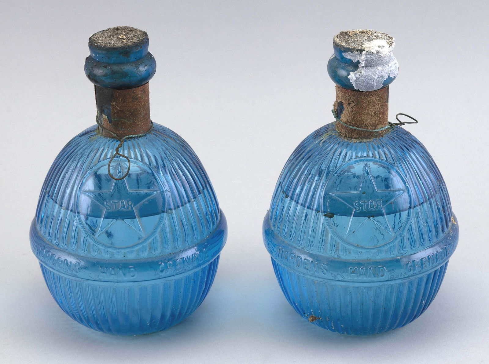 TWO HARDENS STAR GLASS FIRE GRENADE EXTINGUISHERS Late 19th Century Heights 7". (1 of 2)
