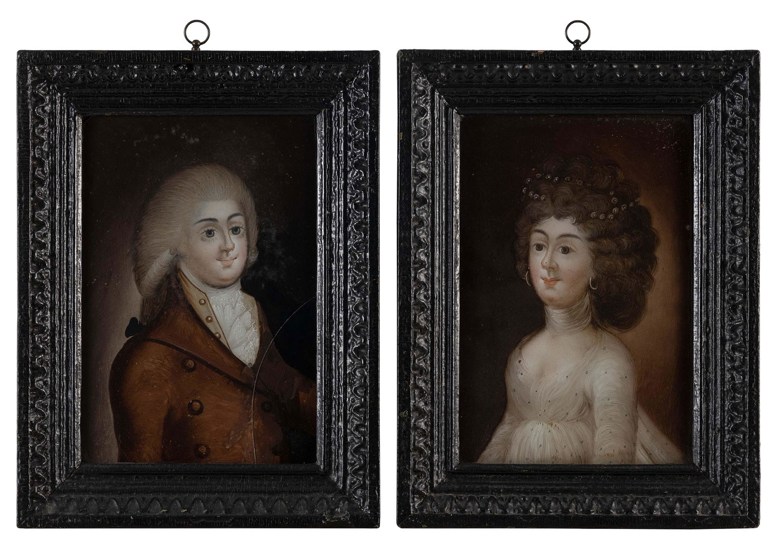 ENGLISH SCHOOL (Early 19th Century,), Half-length portraits of a man and a woman., Reverse paintings (1 of 2)