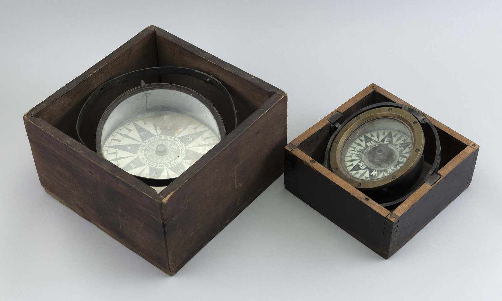 TWO BOXED COMPASSES 19th Century Largest case height 6". Width 10". Depth 9.75". (1 of 1)