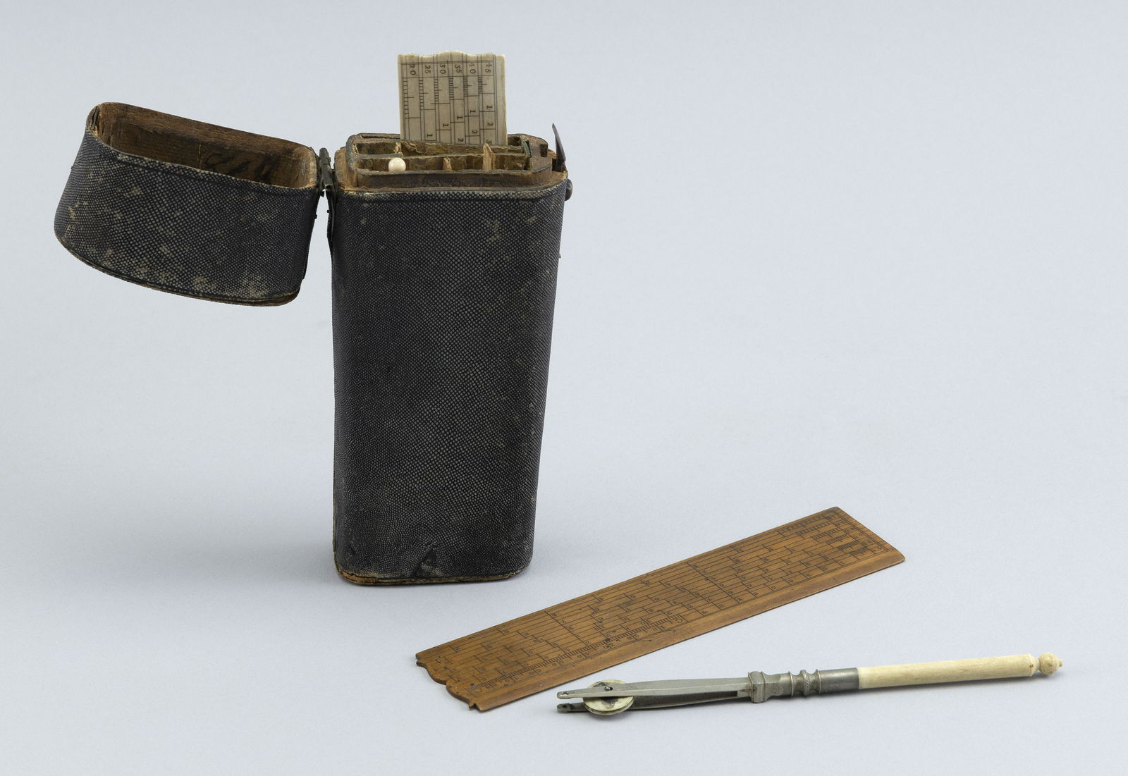 NAVIGATOR'S DRAFTING KIT IN A SHAGREEN CASE England, Circa 1850 Length 7". Width 3". (1 of 2)