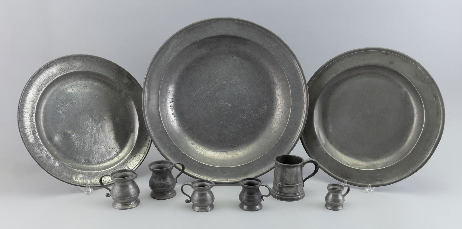 NINE ASSORTED PIECES OF PEWTER 19th Century Diameters from 13.25” to 16.25”. (1 of 1)
