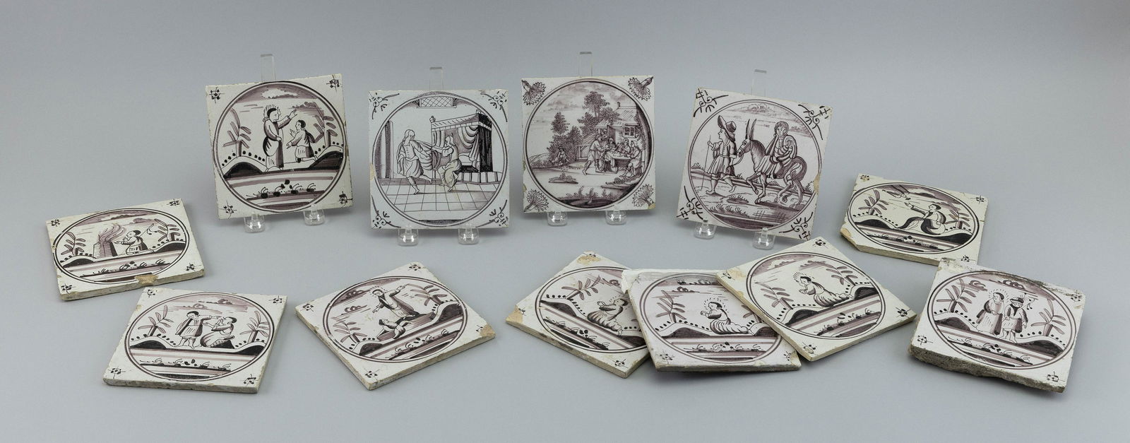 TWELVE MANGANESE DELFT TILES 19th Century Heights 5”. Widths 5”. (1 of 1)