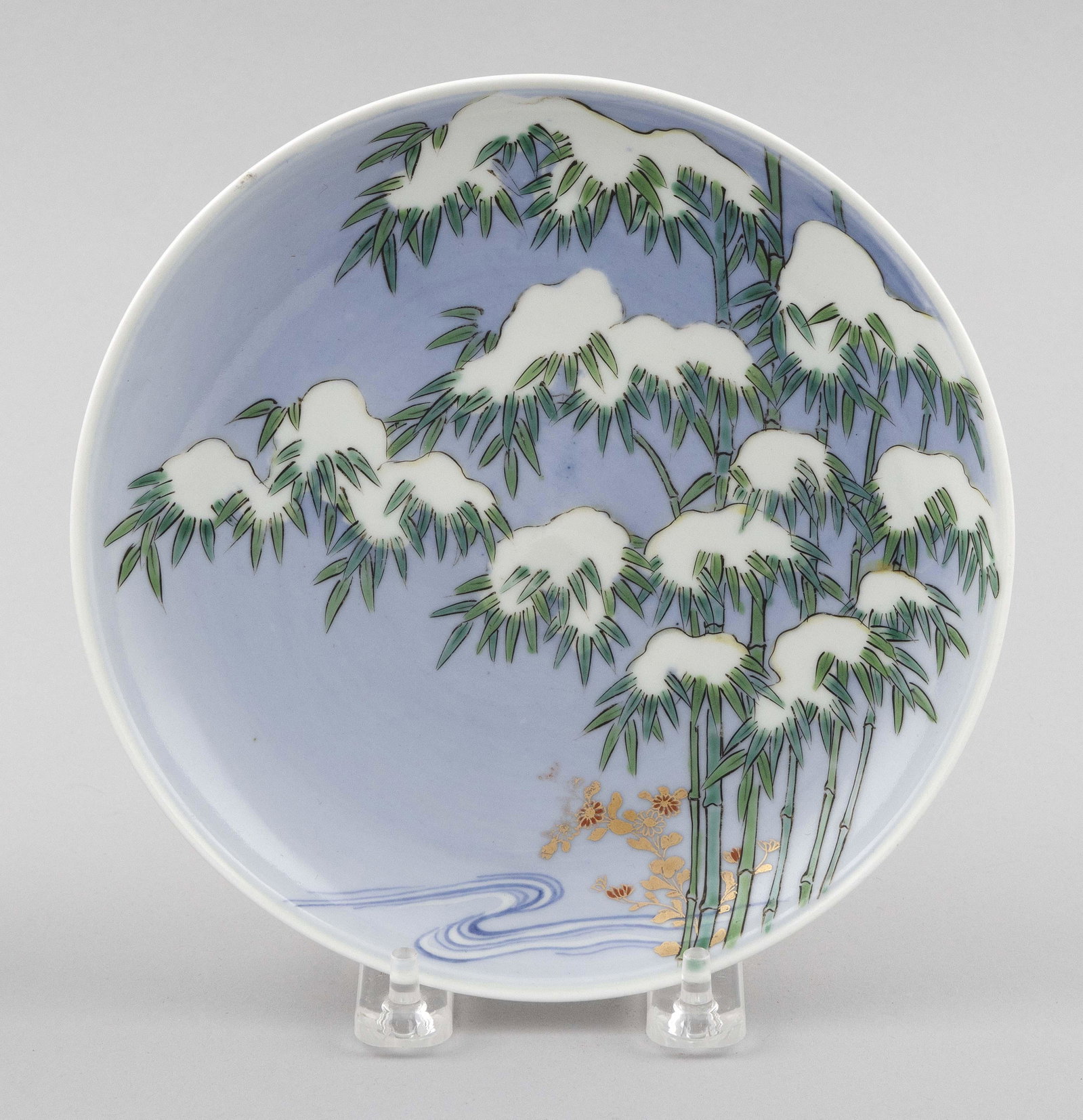 JAPANESE PORCELAIN PLATE 19th Century Diameter 7.25î.: JAPANESE PORCELAIN PLATE 19th Century Depicts snow-covered bamboo with gilt floral decoration. Label on base for Christieís sale SB32, Lot #46. Diameter 7.25î. Provenance: The Estate of Edwa