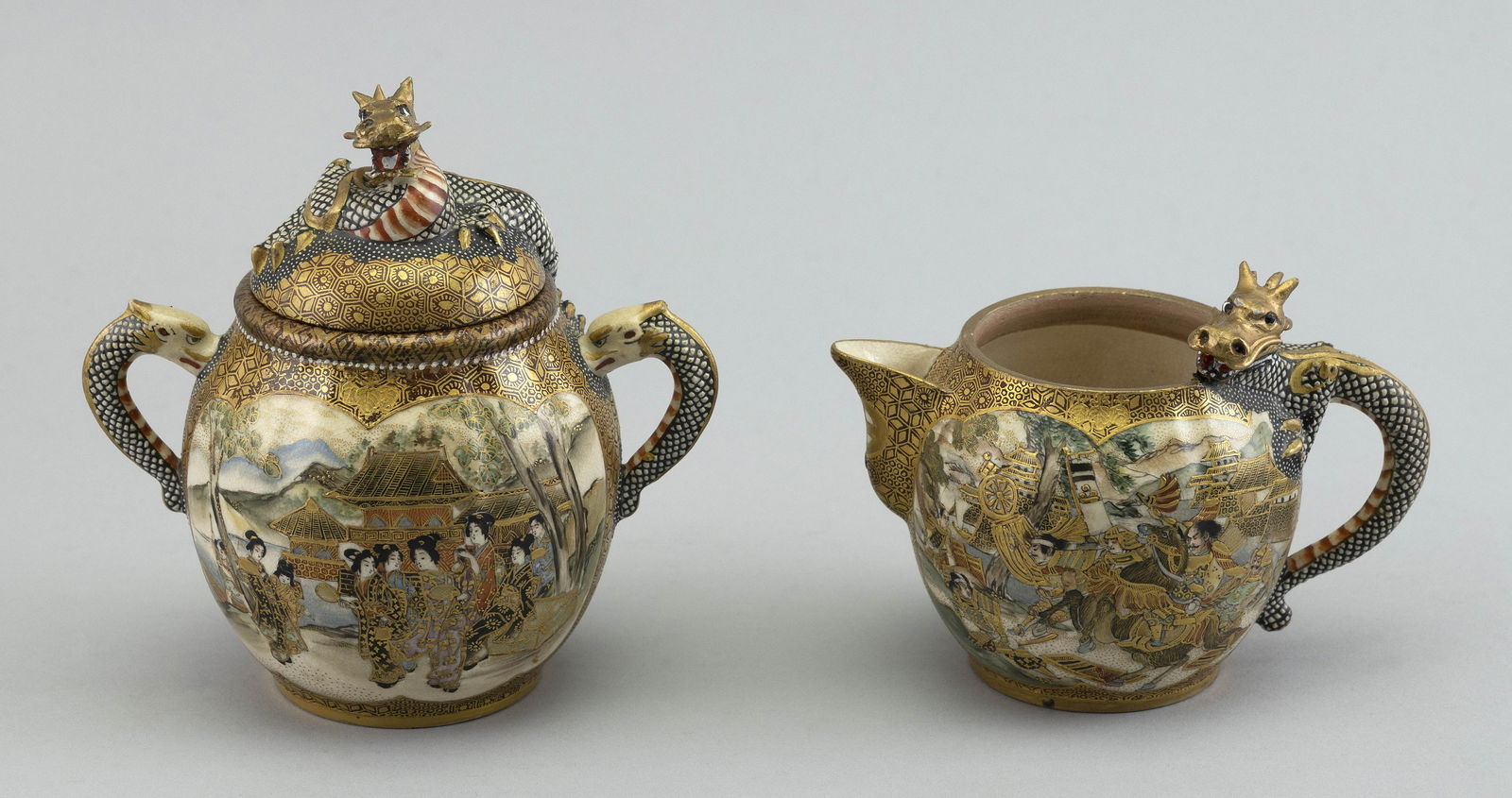 JAPANESE SATSUMA POTTERY CREAMER AND COVERED SUGAR Late Meiji Period Covered sugar height 5.5". (1 of 3)