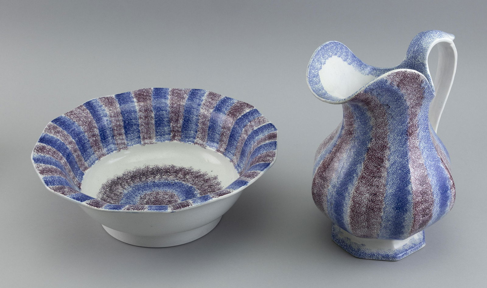 SPATTERWARE WASHBOWL AND PITCHER 19th Century Pitcher height 11î. Bowl diameter 12.5î. (1 of 2)