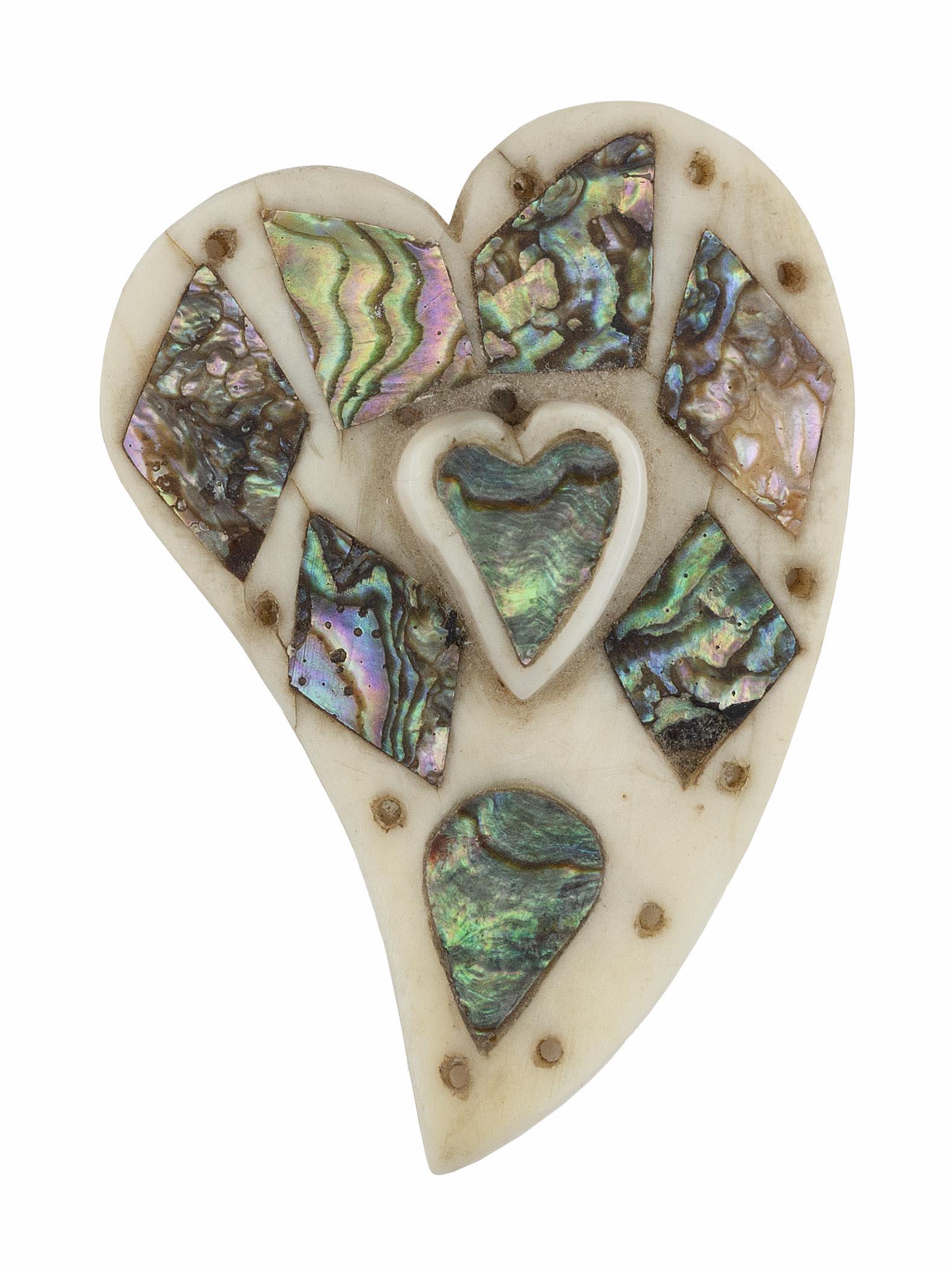 WHALE IVORY NEEDLE CASE 19th Century Length 2.25". Width 1.5".: WHALE IVORY NEEDLE CASE19th CenturyInlaid with a mother-of-pearl heart and geometric shapes.Length 2.25". Width 1.5".Provenance:Rafael Osona, Nantucket, Massachusetts.