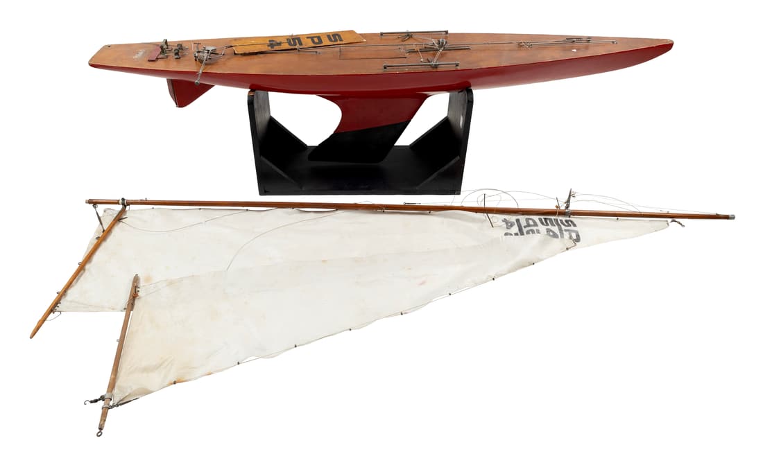 POND MODEL OF AN X BOAT Circa 1940s Height 82.5î. Length 71.25î.: POND MODEL OF AN X BOATCirca 1940sRed hull. Lead-weighted keel. Complete with mast, sails and rigging.Height 82.5î. Length 71.25î.