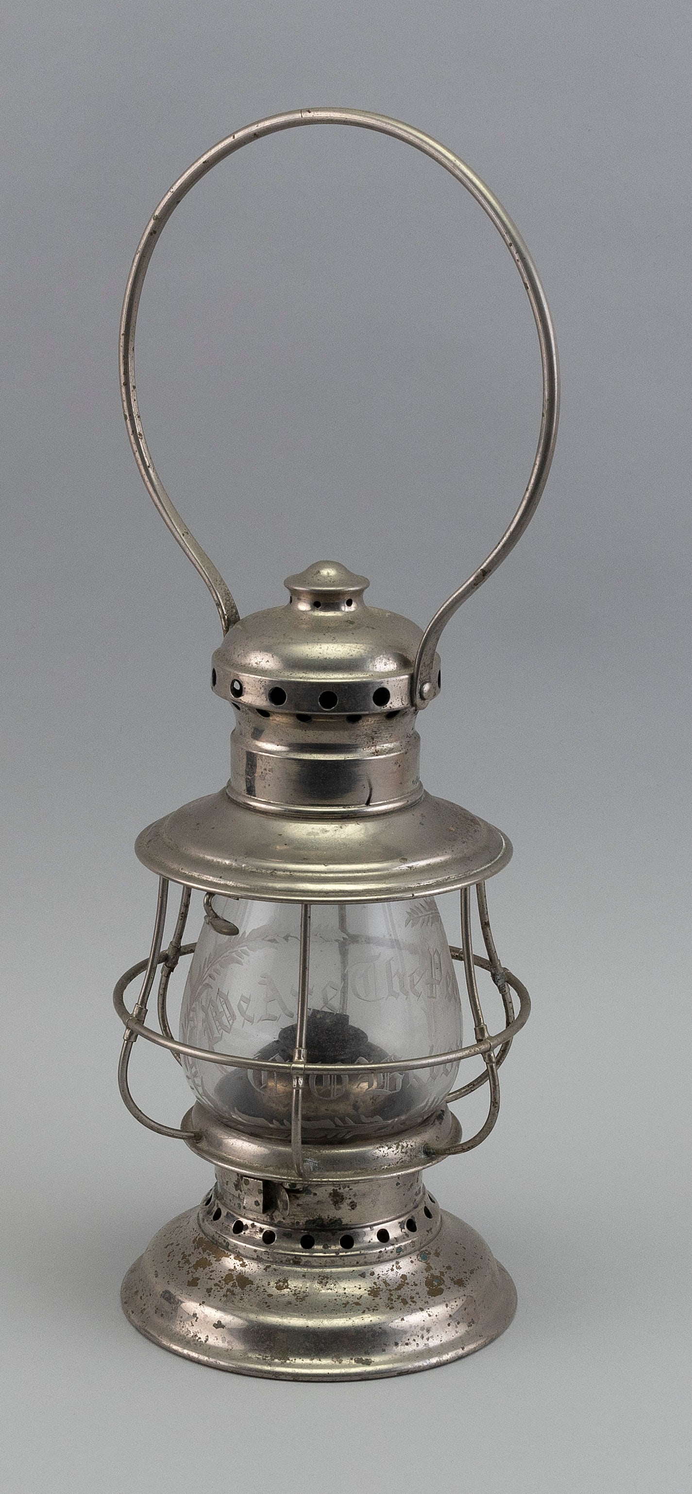 NICKEL LANTERN Third Quarter of the 19th Century Height excluding handle 10î.: NICKEL LANTERN Third Quarter of the 19th Century Possibly Boston & Sandwich Glassworks. Possibly made for the Centennial Exposition in Philadelphia. Globe etched ìWe Are The People C.O. Brion&quo
