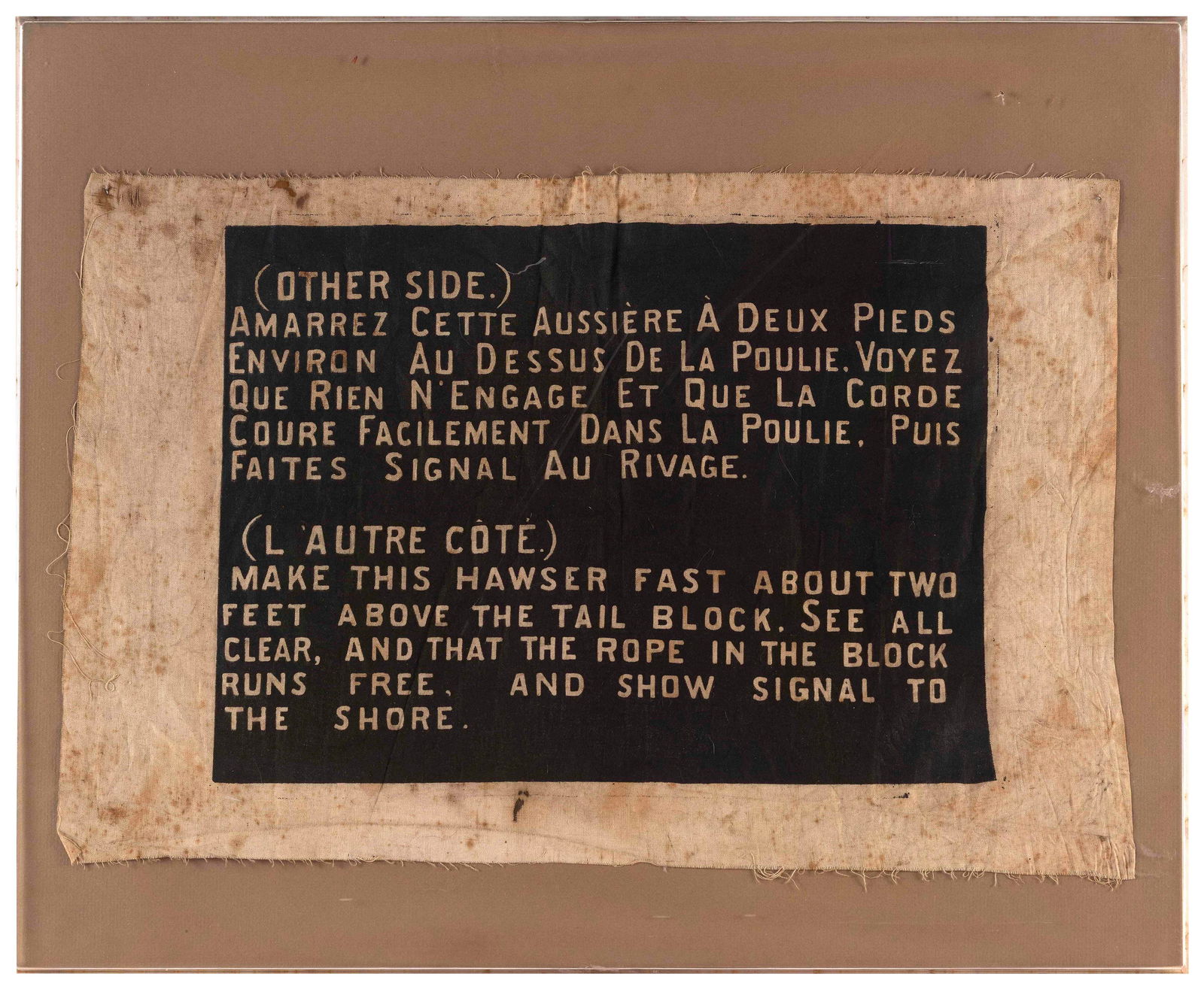MARITIME INSTRUCTIONAL SIGN Late 19th/Early 20th Century Framed 16.25î x 20.25î.: MARITIME INSTRUCTIONAL SIGNLate 19th/Early 20th CenturyPertaining to a hawser. Instructions in English and French. Painted on cloth. Housed in a contemporary lucite frame.Framed 16.25î x 20.25