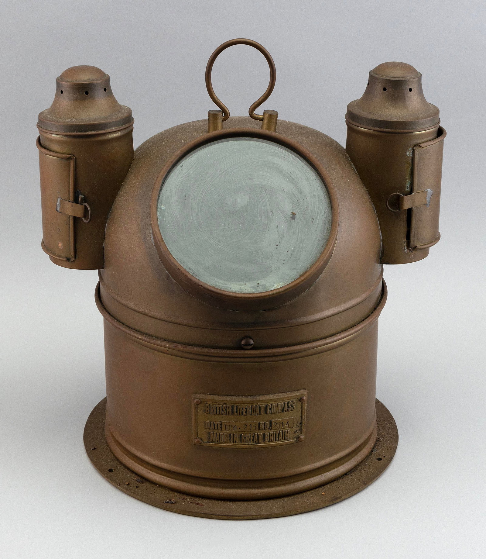 COPPER YACHT BINNACLE Early 20th Century Height 14î. Width 13.5î. Depth 11.25î.: COPPER YACHT BINNACLE Early 20th Century Metal plate on front marked ìBritish Lifeboat Compassî. Two side lamps with original reservoirs. Height 14î. Width 13.5î. Depth 11.25î