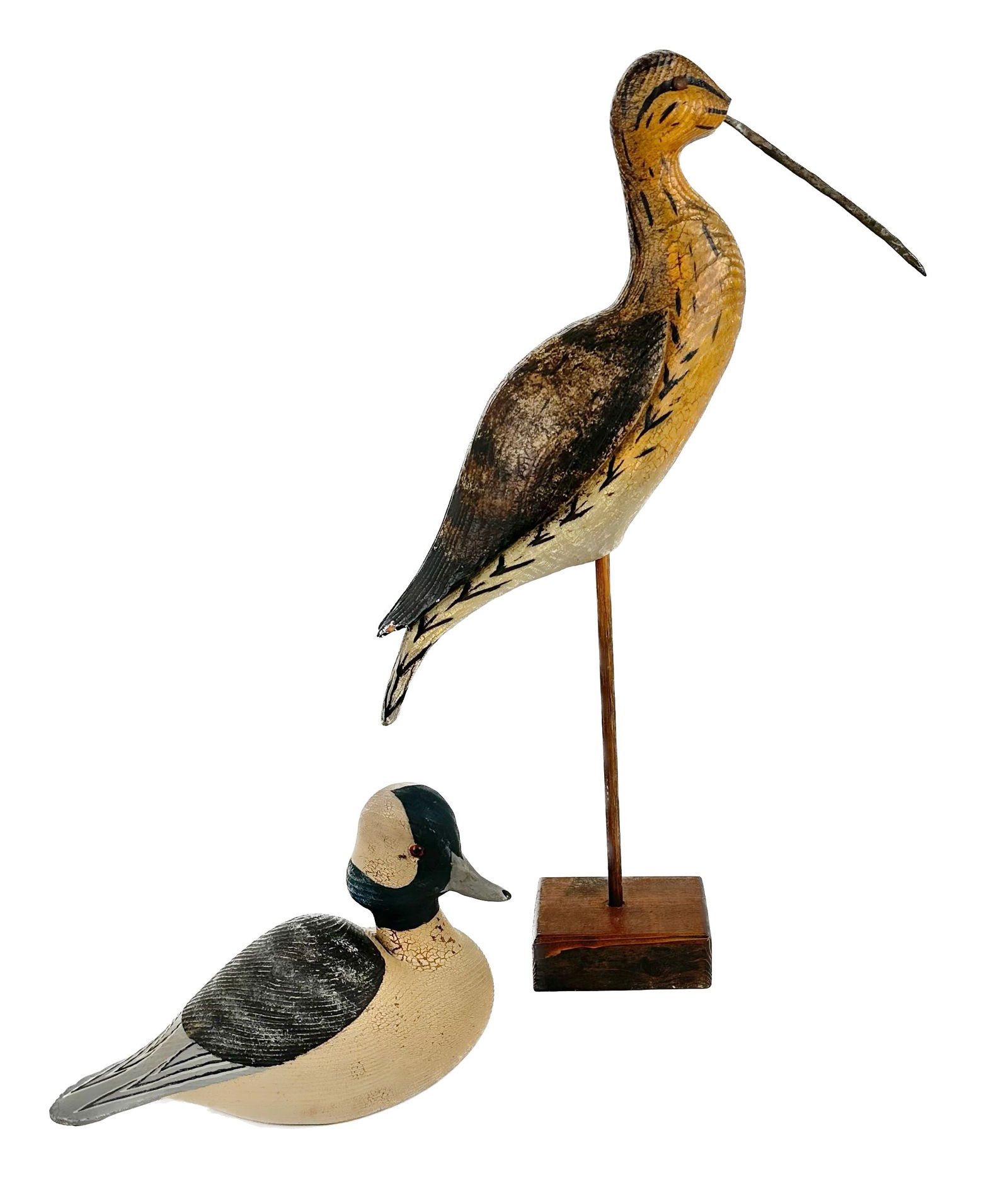 TWO THOMAS LANGAN BIRD CARVINGS Canton, North Carolina, 1942- Lengths 11" and 17î. (1 of 3)