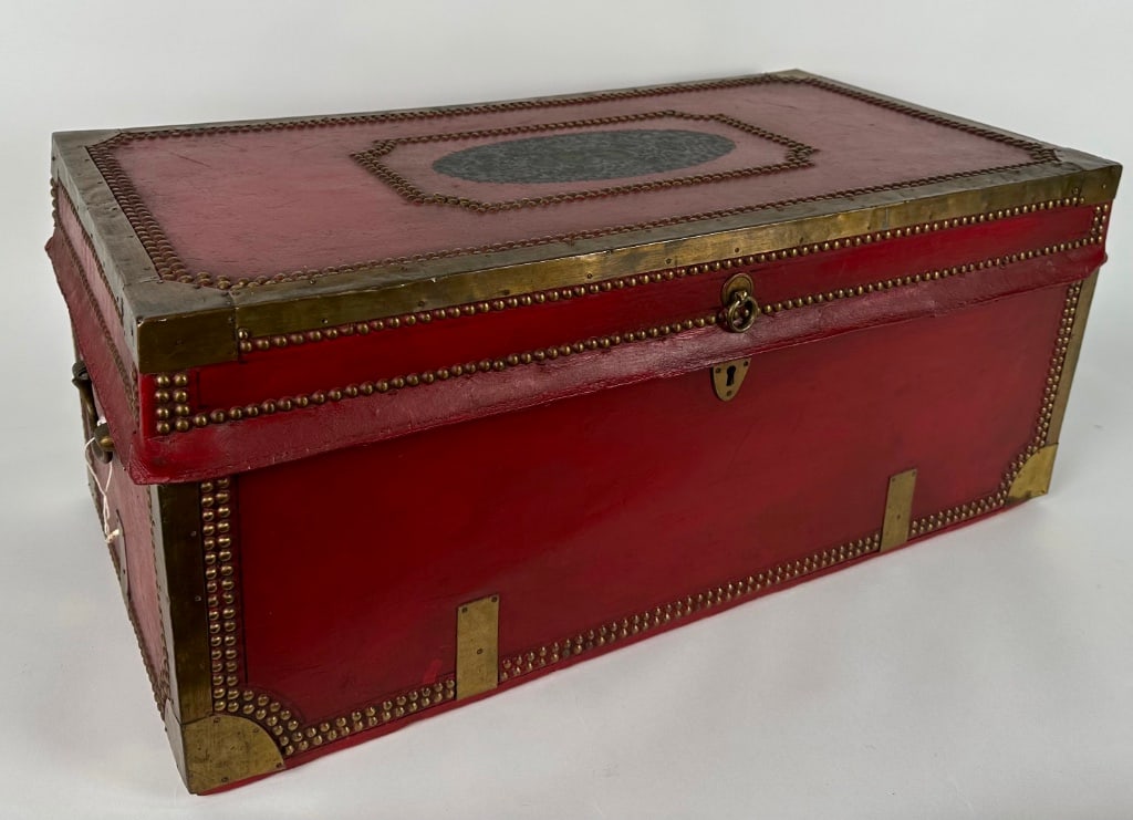 LEATHER-COVERED CAMPHORWOOD TRUNK 19th Century Height 13î. Width 31î. Depth 15.5î. (1 of 2)