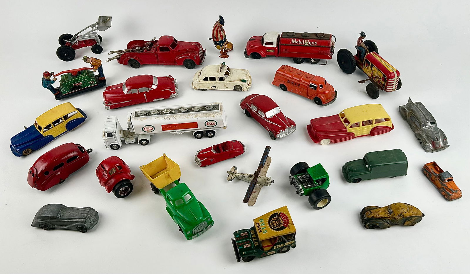 SIXTY SMALL TOYS, MOSTLY CARS 20th Century Lengths from 2" to 12". (1 of 3)