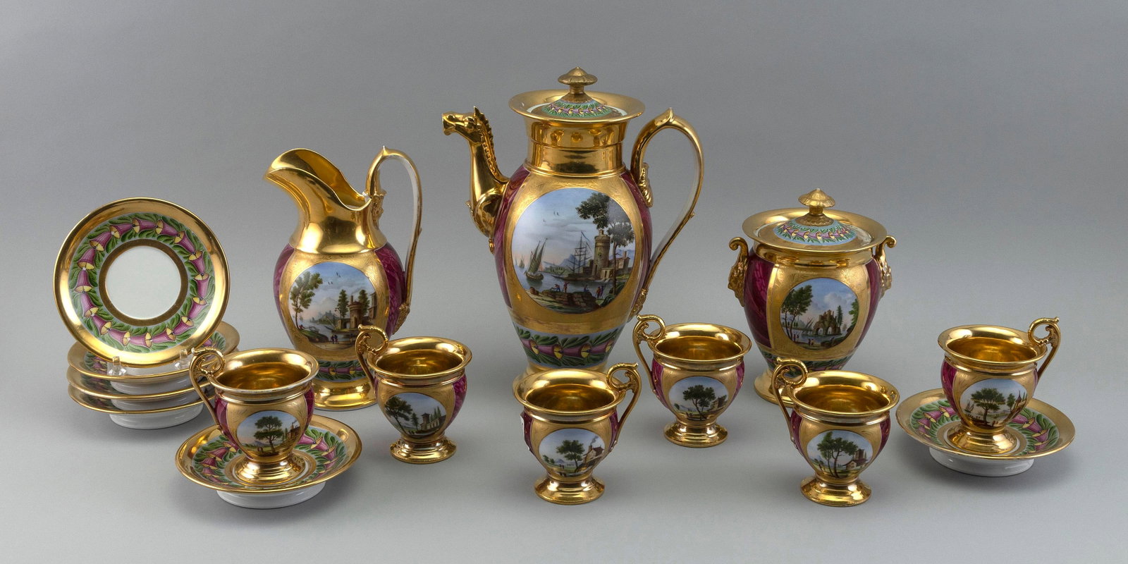 FRENCH EMPIRE PORCELAIN FIFTEEN-PIECE COFFEE SERVICE Mid-19th Century Teapot height 10.5î.: FRENCH EMPIRE PORCELAIN FIFTEEN-PIECE COFFEE SERVICE Mid-19th Century Each piece with hand-painted scenic landscape panels and bands of bellflowers against a mottled violet ground. Delicate gilt brush