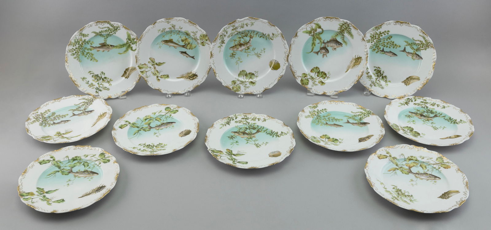 SET OF TWELVE LIMOGES PORCELAIN FISH PLATES France, 19th Century Diameters 10î. (1 of 2)