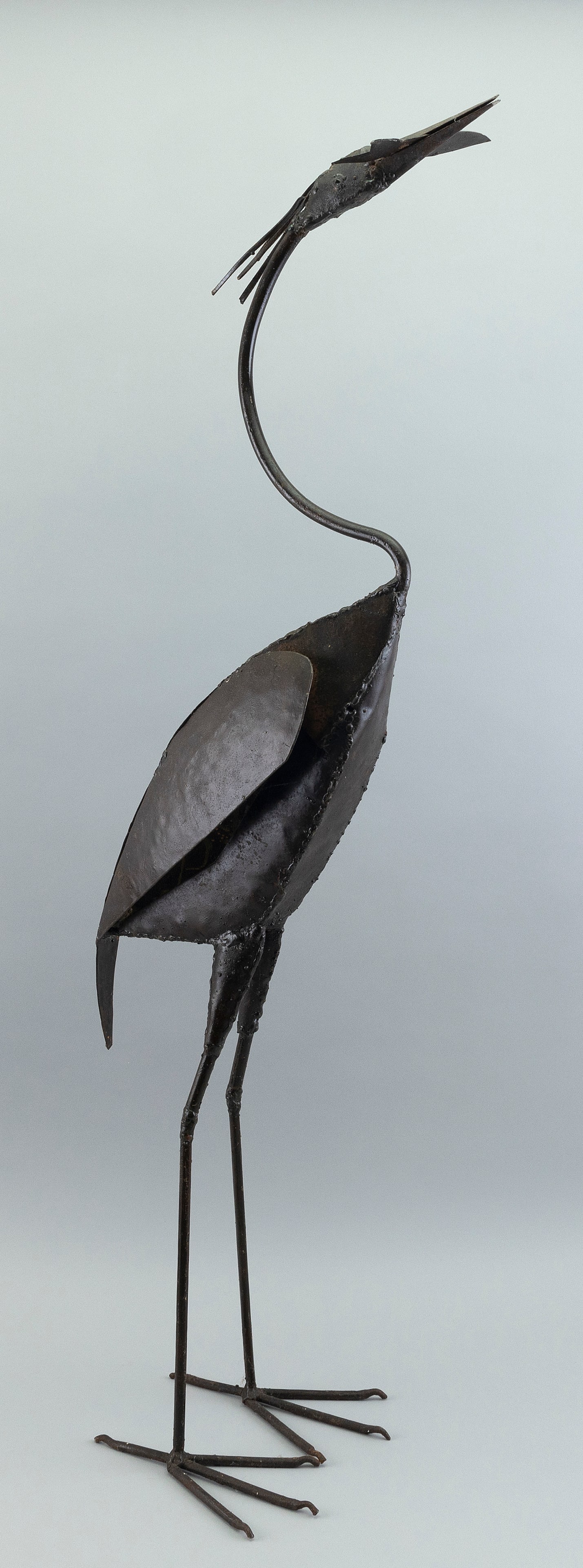 CAST METAL JAPANESE-STYLE CRANE 20th Century Height 37.5î.: CAST METAL JAPANESE-STYLE CRANE 20th Century Standing with a fish in its mouth. Height 37.5î.