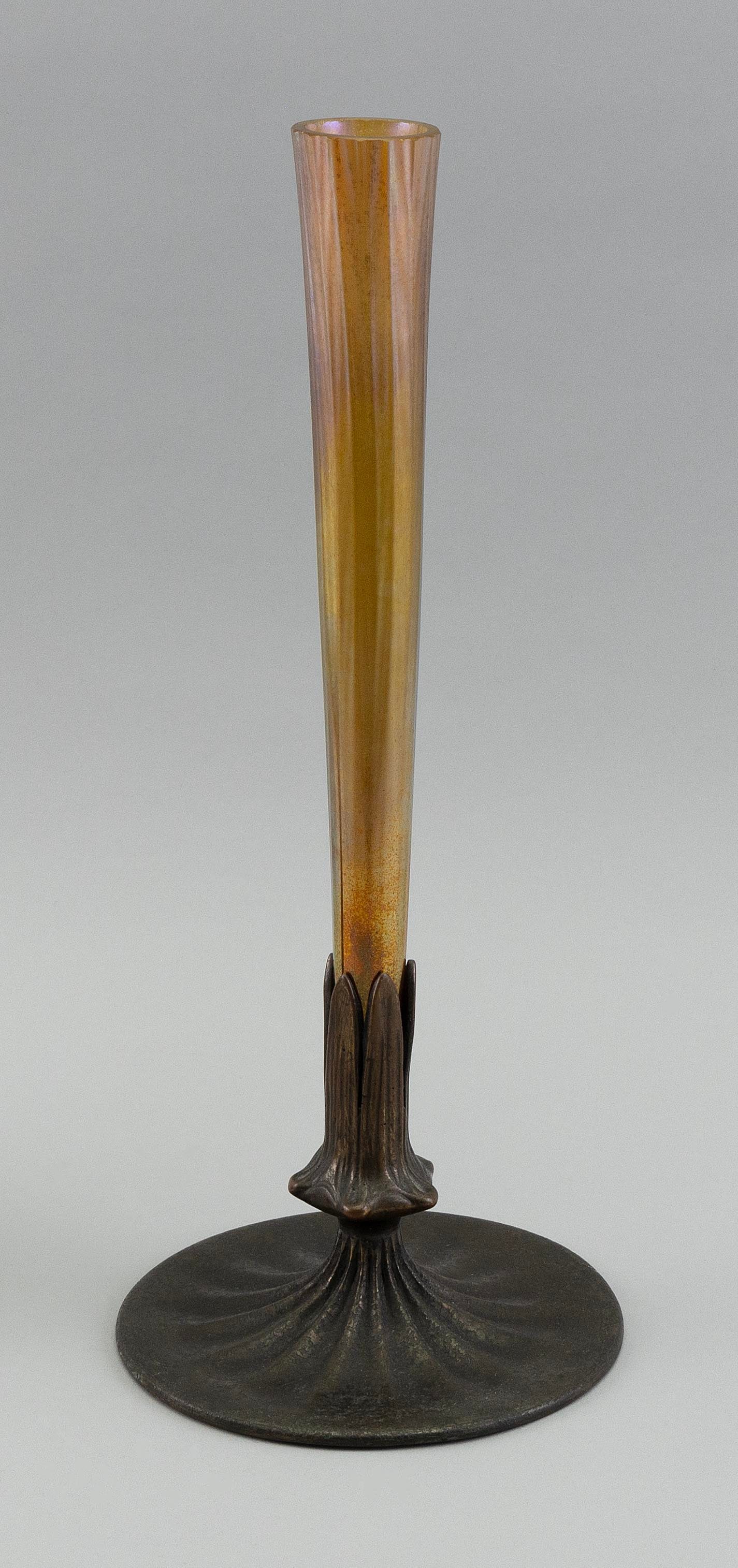 TIFFANY BRONZE AND FAVRILE GLASS BUD VASE Early 20th Century Height 13.25". (1 of 1)
