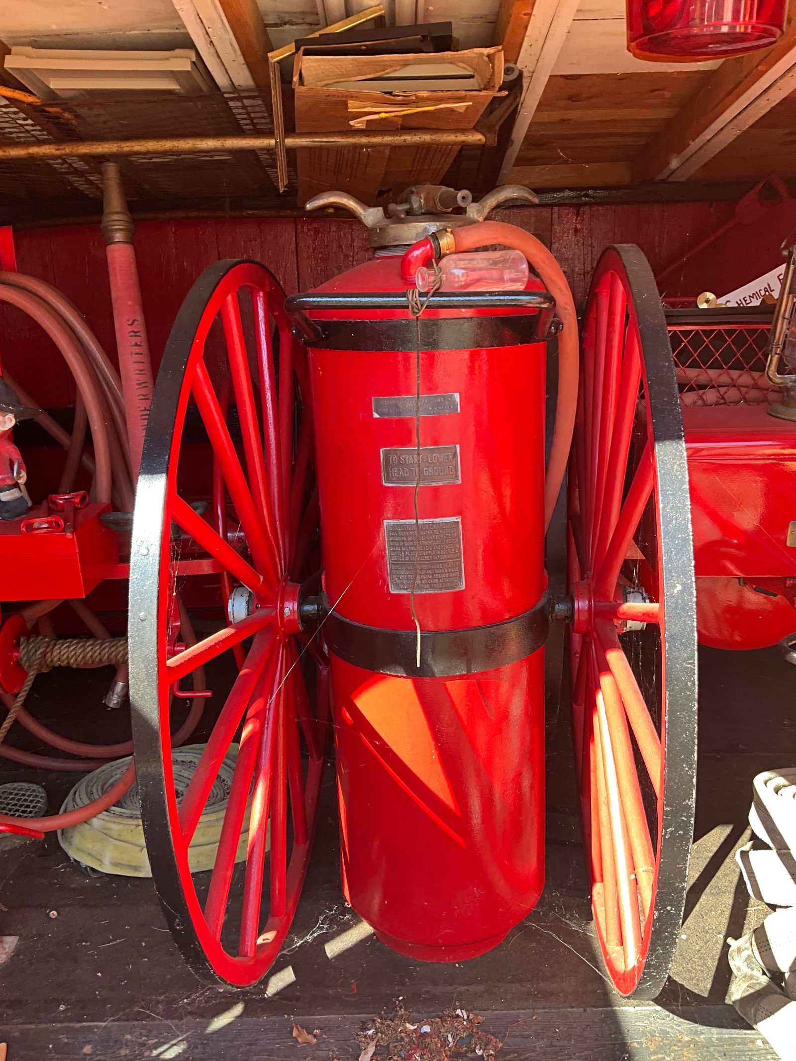 UNDERWRITERS' LABORATORIES FIRE EXTINGUISHER ON WHEELS 19th Century Height 55". Length 42". (1 of 2)