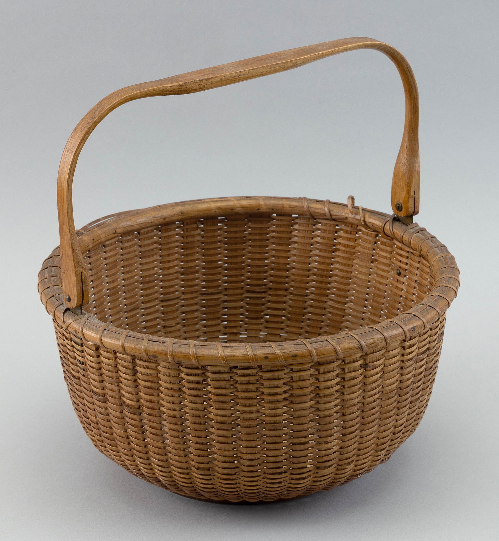 MITCHELL RAY NANTUCKET BASKET Nantucket, 1877-1956 Height 5.25”. Diameter 10.5”. (1 of 3)