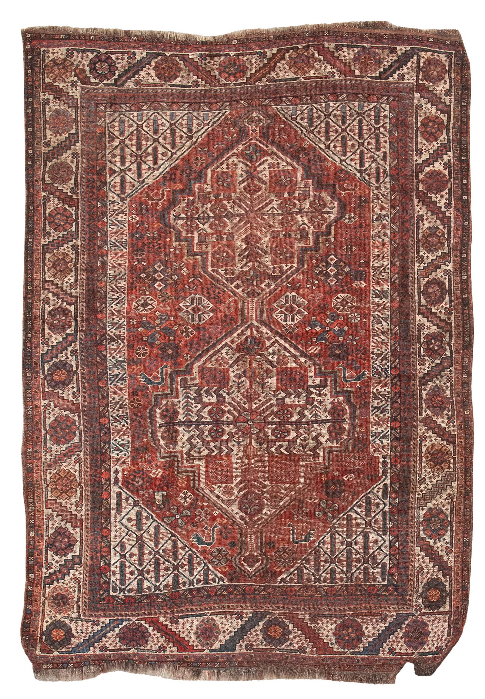 SOUTH PERSIAN RUG: 4’0" X 5’8" First Half of the 20th Century: SOUTH PERSIAN RUG: 4’0" X 5’8" First Half of the 20th Century Red field with typical geometric linked ivory medallions and stylized branches and blossoms throughout. Subtle bird figures appear at 