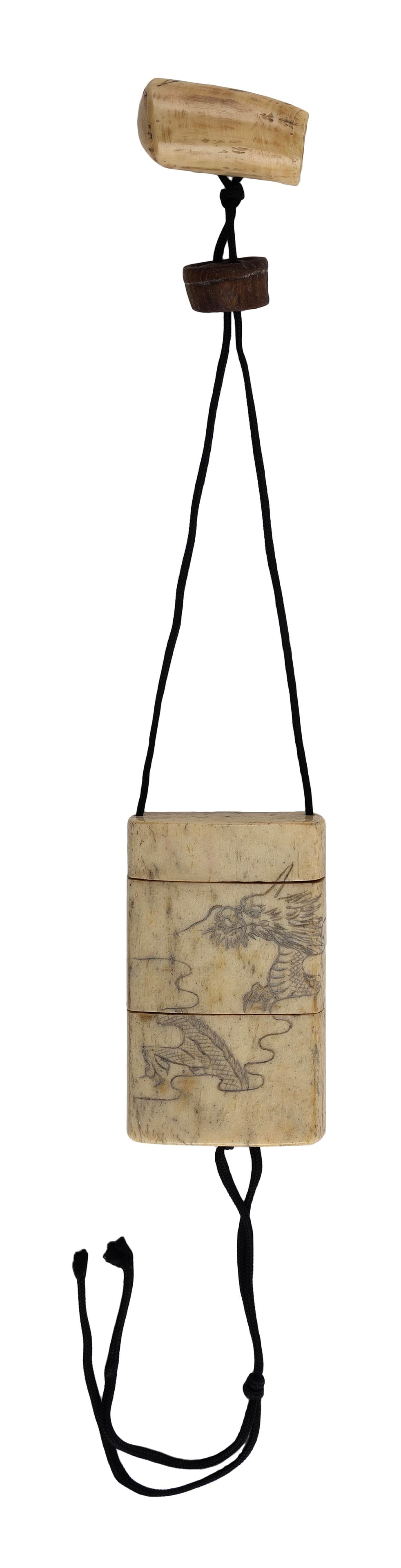 JAPANESE STAGHORN THREE-CASE INRO Late Meiji Period Inro length 2.25". Netsuke length 2". (1 of 2)