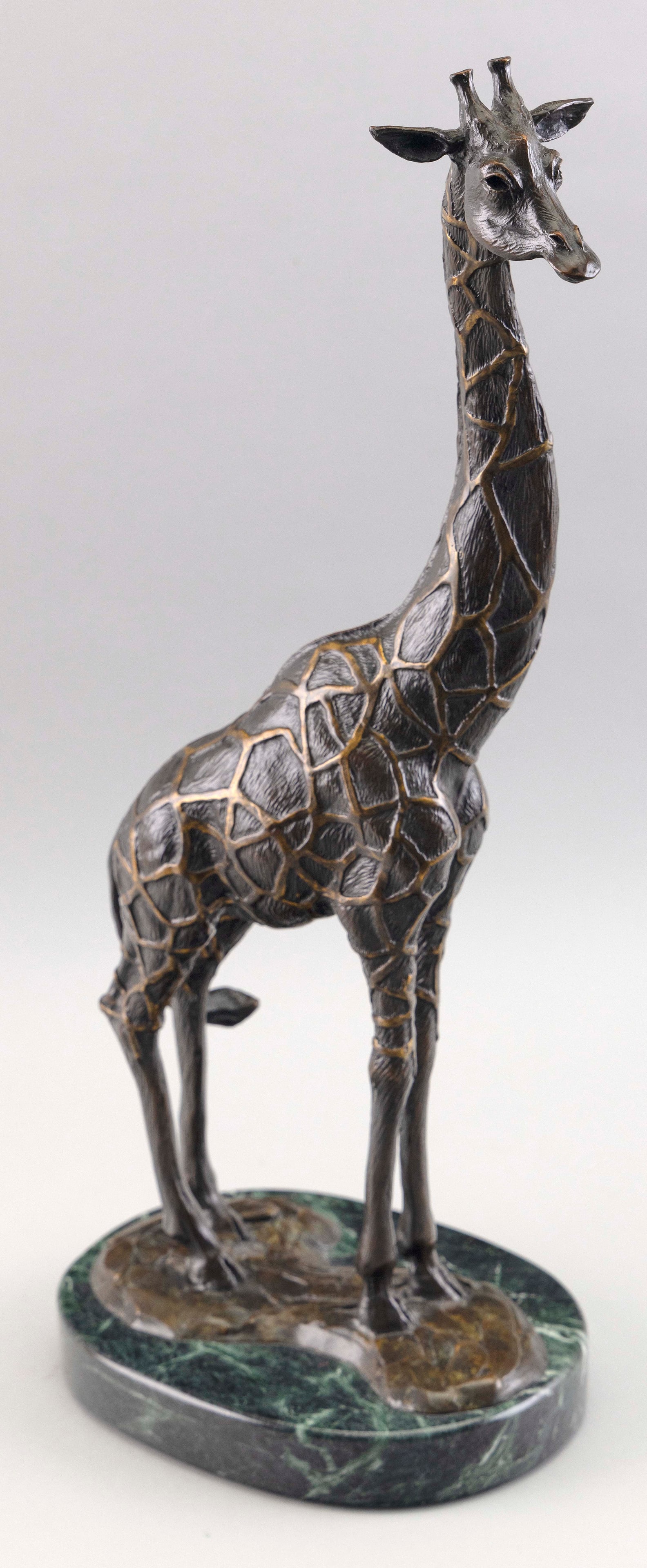 GEOFFREY CAMP SMITH (Florida, 1961-), Giraffe., Bronze on a green marble base, total height 19". (1 of 4)