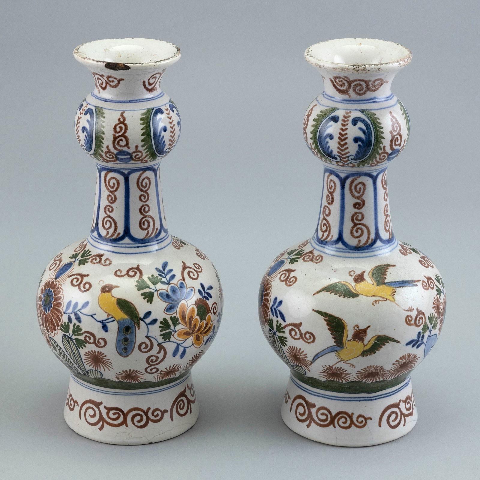 PAIR OF DELFT BOTTLE VASES Late 19th/Early 20th Century Heights 10.25". (1 of 3)