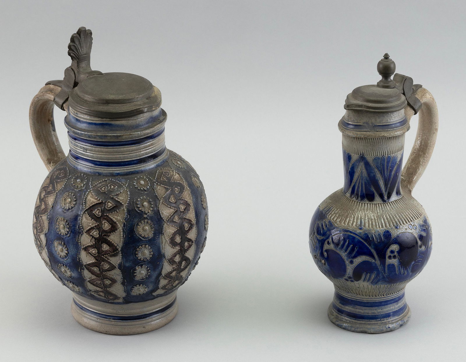 TWO CONTINENTAL SALT GLAZE STONEWARE EWERS 19th/20th Century Heights approx. 9". (1 of 2)