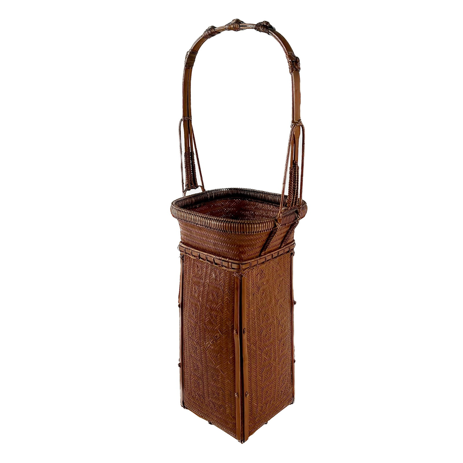 JAPANESE IKEBANA VASE Late Meiji Period Height 24".: JAPANESE IKEBANA VASE Late Meiji Period Rectangular form with flared mouth. Splintwood handle with knotted bamboo details. Body with woven basketry panels. Height 24".