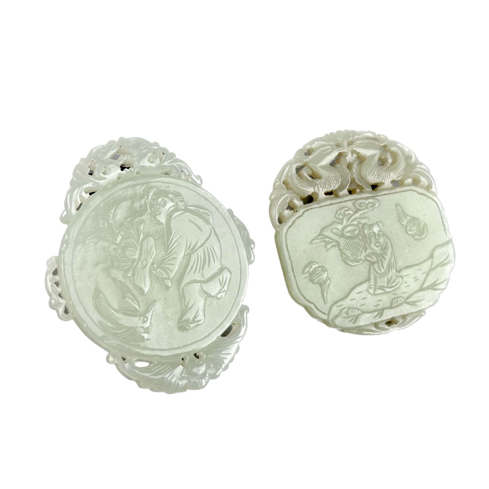 TWO CHINESE CARVED CELADON JADE PLAQUES Lengths 2.25" and 2.5". (1 of 5)