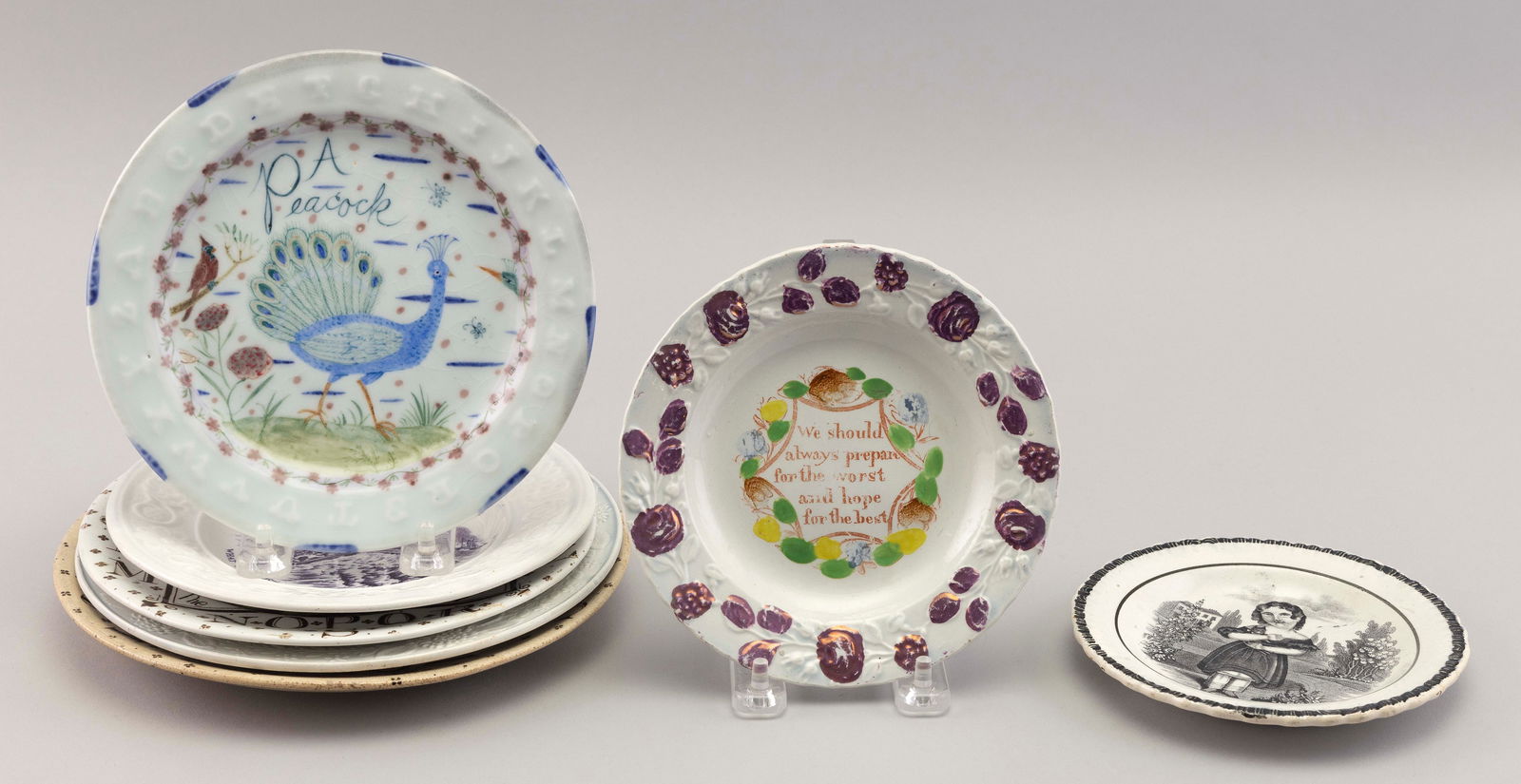 SEVEN CHILDREN’S CERAMIC PLATES 19th/20th Century Diameters from 5" to 8.5". (1 of 2)