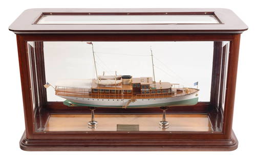 BUILDER'S PRESENTATION MODEL OF THE MOTOR YACHT "NIRVANA IV" America, Circa 1920 Case height 20.25".: BUILDER'S PRESENTATION MODEL OF THE MOTOR YACHT "NIRVANA IV"America, Circa 1920Hull built up from the solid, the bottom painted a pale green and the topsides painted white, with an applied sheer strak