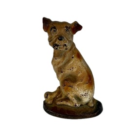 CAST IRON DOORSTOP IN THE FORM OF A SEATED DOG 20th Century Height 9".